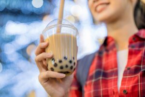 woman drinks boba tea
